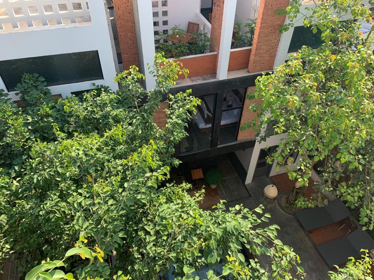 1004 Boutique Hotel เสียมราฐ ภายนอก รูปภาพ